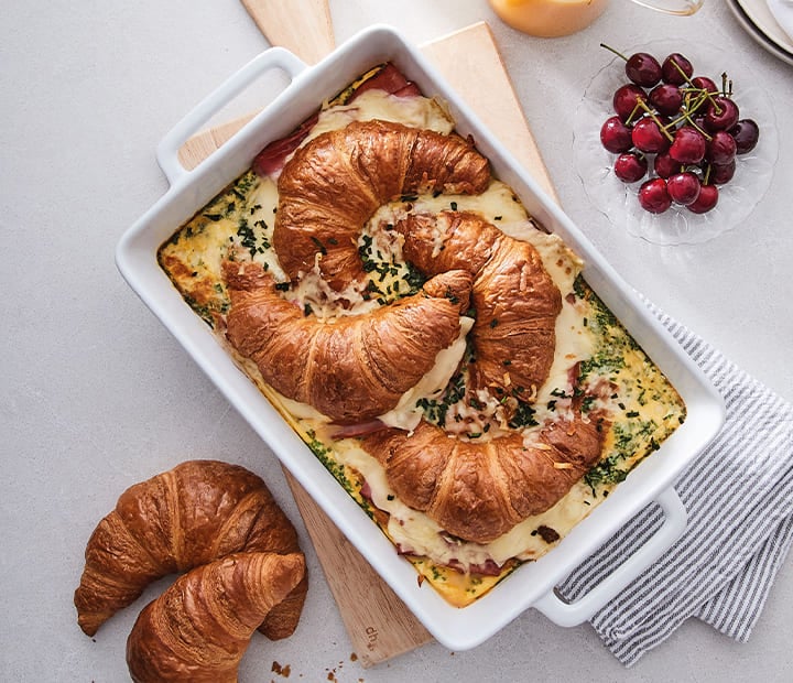 Easy, savoury croissant brekky bake recipe with cheese, ham and herbs